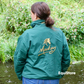 Mackey horse riding jacket, blouson style in green with large logo on back 